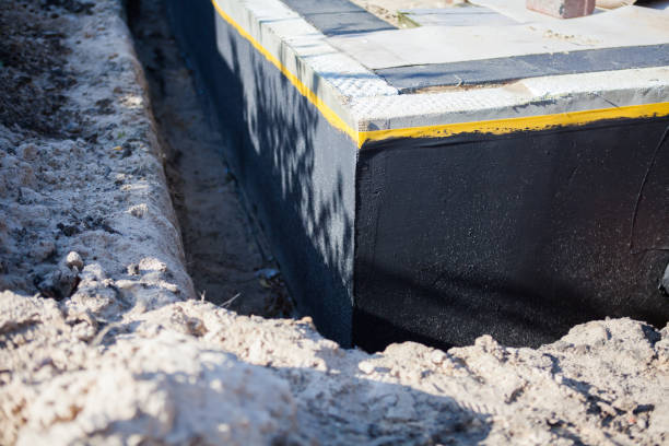 Professional Emergency Waterproofing technician working in Perrysburg, OH